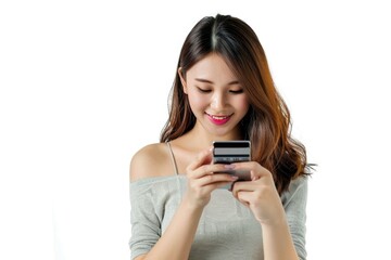 Fototapeta premium A person checking their mobile device, possibly texting or browsing