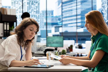 Fototapeta premium Team of HR professional in stock exchange company identifying right candidates for job opening. Employers working for financial business after finishing screening process