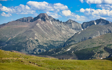 Fototapeta premium Cars stop along Trail Ridge Road in Colorado's Rocky Mountain National Park for close-up views of the peaks