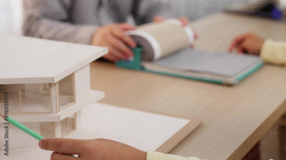 Poster slow motion home designer using architectural equipment review and measure architectural house model