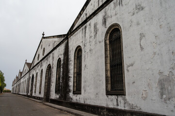 Old Andalusian bodega wine cellar, aging sherry wine in barrels, spanish jerez fortified wine,...