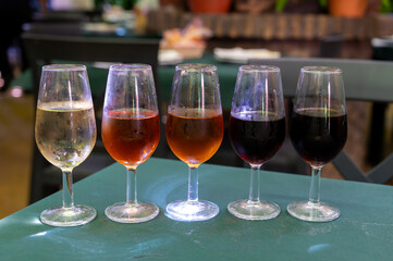 Flight of five sherry wine from barrels, fino, manzanilla, olorosso, amontillado, pedro ximenez jerez wines in old tavern, wine tasting, Sanlucar de Barrameda, Cadiz, Andalusia, Spain