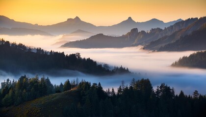 Fototapeta premium Misty Mountains at Dawn, Shrouded in Fog and Illuminated by Soft Light