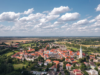 Obraz premium Summer aerial skyline cityscape of Nowe Miasteczko, Nowa Sól County, Lubusz (lubuskie). Wide panoramic view of the old town and market square (Rynek)