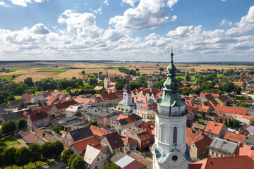 Obraz premium Summer aerial skyline cityscape of Nowe Miasteczko, Nowa Sól County, Lubusz (lubuskie). Wide panoramic view of the old town and market square (Rynek)