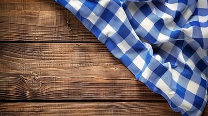 Obraz premium Elegant blue and white checkered silk tablecloth draped over a rustic wooden surface, Traditional Bavarian, banner empty space