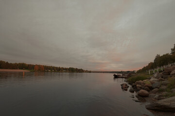 Sunset View Over a Calm River in Rovaniemi