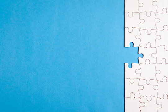Missing piece of white jigsaw puzzle, incomplete task