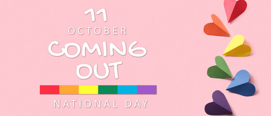 Colorful hearts made of paper on pink background. LGBT concept