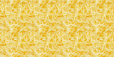 Obraz premium shredded paper filler in yellow color with thin, delicate strips, shredded paper filler texture background