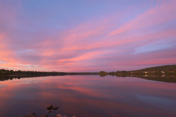 Vibrant Sunset Over Calm Waters in Rovaniemi