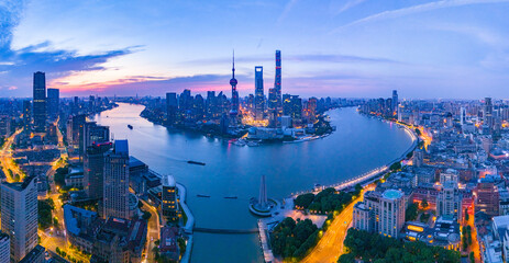 Obraz premium Aerial view of modern city skyline and buildings at sunrise in Shanghai