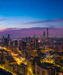 Obraz premium Aerial view of modern city skyline and buildings at sunrise in Shanghai