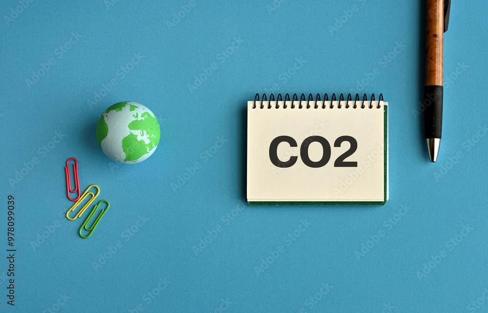 Poster there is notebook with the word co2. it is as an eye-catching image.