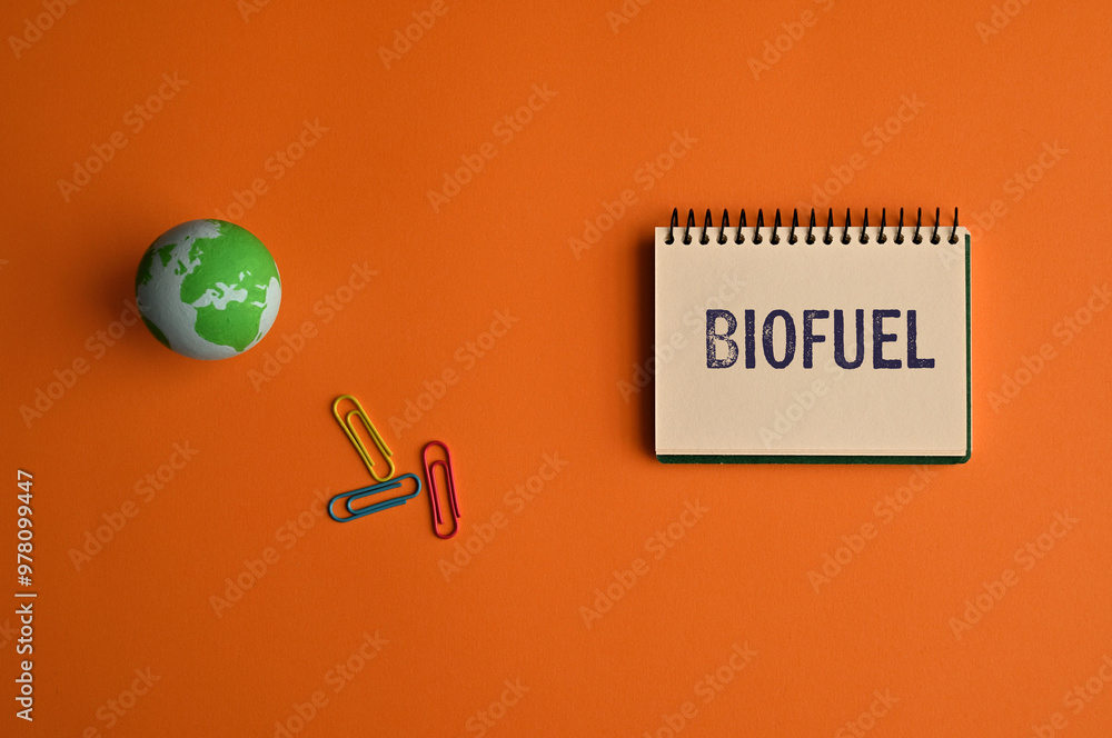 Poster there is notebook with the word biofuel. it is as an eye-catching image.