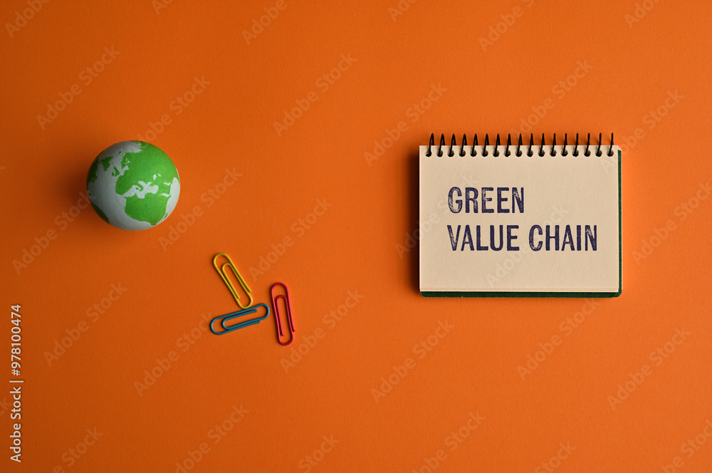 Poster there is notebook with the word green value chain. it is as an eye-catching image.
