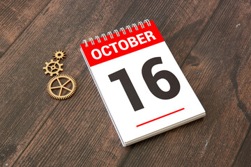 Wooden calendar with date October 16