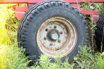 Large tractor wheel close-up outdoors.