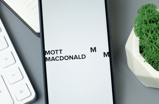New York, USA - 30 August 2024: Mott MacDonald Logo on Phone Screen, Company Icon on Display