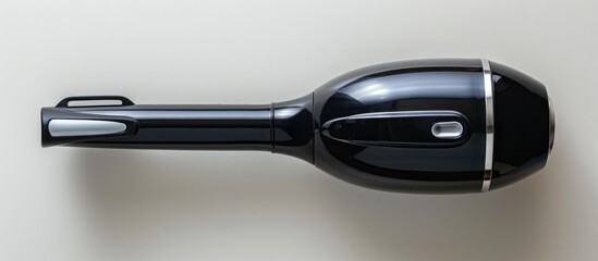 Sleek and Efficient Vacuum Cleaner for Spotless Home Cleaning   A modern black and silver appliance with powerful suction and advanced features to thoroughly clean floors carpets