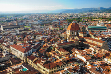 Panoramic view of Florence with iconic red-tiled roofs and ancient architecture