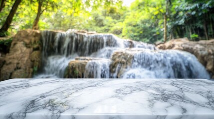 Fototapeta premium A serene waterfall scene with a marble countertop in the foreground, emphasizing nature's beauty.