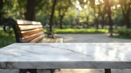 A marble table in a serene park setting with a blurred bench and sunlight filtering through trees.