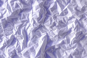 Obraz premium Photo of Crumpled sheet of toned white paper. Background texture for backdrops or mapping