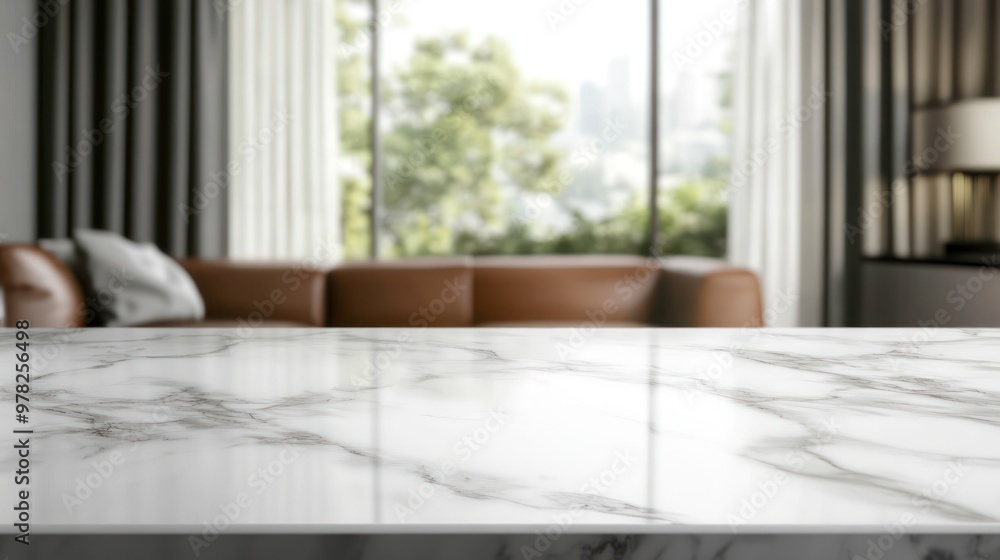 Wall mural A marble countertop in a modern living room with a view of greenery outside.