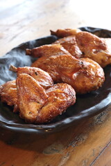 pieces of roast chicken, known in Brazil as galeto on the plate
