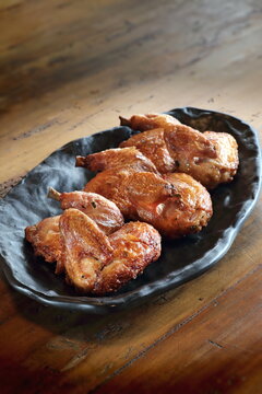 pieces of roast chicken, known in Brazil as galeto on the plate