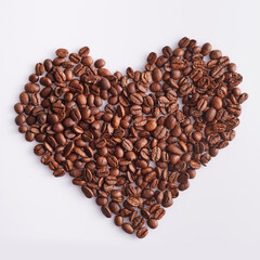 Fresh Whole coffee beans in the shape of a heart