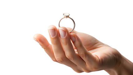 Hand holding an engagement ring, symbolizing love and commitment