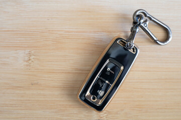 Remote control car key, keyless, motorcycle, black, gold, copy space.