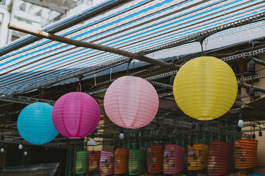 Lanterns hanging on a stand in the streets of Cholon in Ho Chi Minh City Vietnam during Mid Autumn Festival of Lunar Calendar
