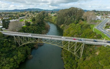 Fototapeta premium Traffic over the Victoria Bridge crossing the Waikato River Cambridge, Waikato, New Zealand.
