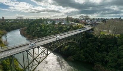 Traffic over the Victoria Bridge crossing the Waikato River Cambridge, Waikato, New Zealand.