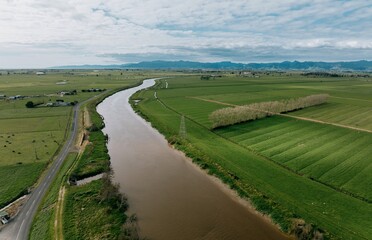The Waihao river looking towards the Coromandel Peninsula, Ngatea, Waikato, New Zealand.