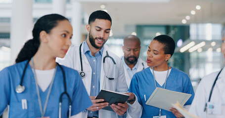 Meeting, tablet and doctors walking in hospital for medical service, consulting and surgery...