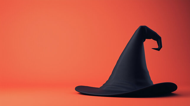A classic black witch hat sits on a bright orange background, ideal for Halloween designs, party invitations, or creative crafts this October, copy space