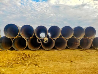 pipes on blue sky, Large Pipe Piles on Construction Projects