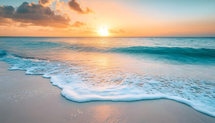 Fototapeta premium Crystal-clear turquoise waters with gentle waves lapping at a pristine beach under a golden sunset