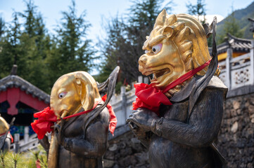 The bronze statues with animal head situated in Jade water village in Lijiang, China.