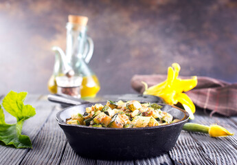 Frying pan with fried seasonal vegetables, spring food