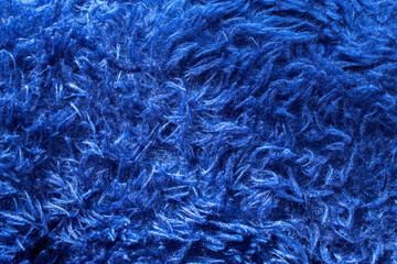 blue texture fur carpet mattress floor. fluff on the blue carpet	