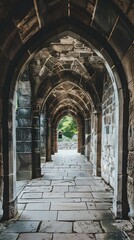Obraz premium Stone Archway Leading to a Green Garden