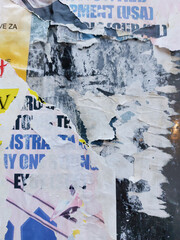 Fototapeta premium Torn street poster background, ripped weathered paper collage