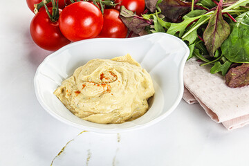 Creamy hummus in the bowl