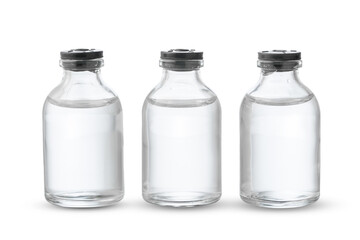Clear Glass Bottles Filled With Liquid on a White Background