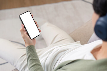 Digital Nomad Relaxing with Smartphone for Online Connectivity